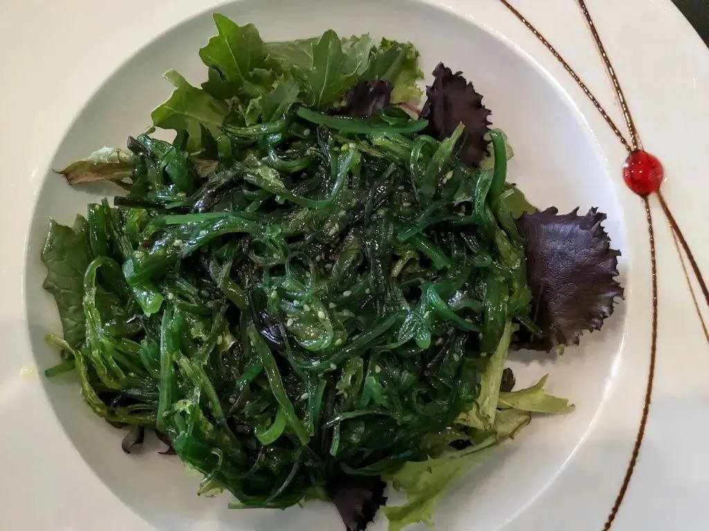 Crisp seaweed salad with mixed leafy greens and sesame seeds at Green Papaya Thai Cuisine, a Thai Restaurant in Jacksonville